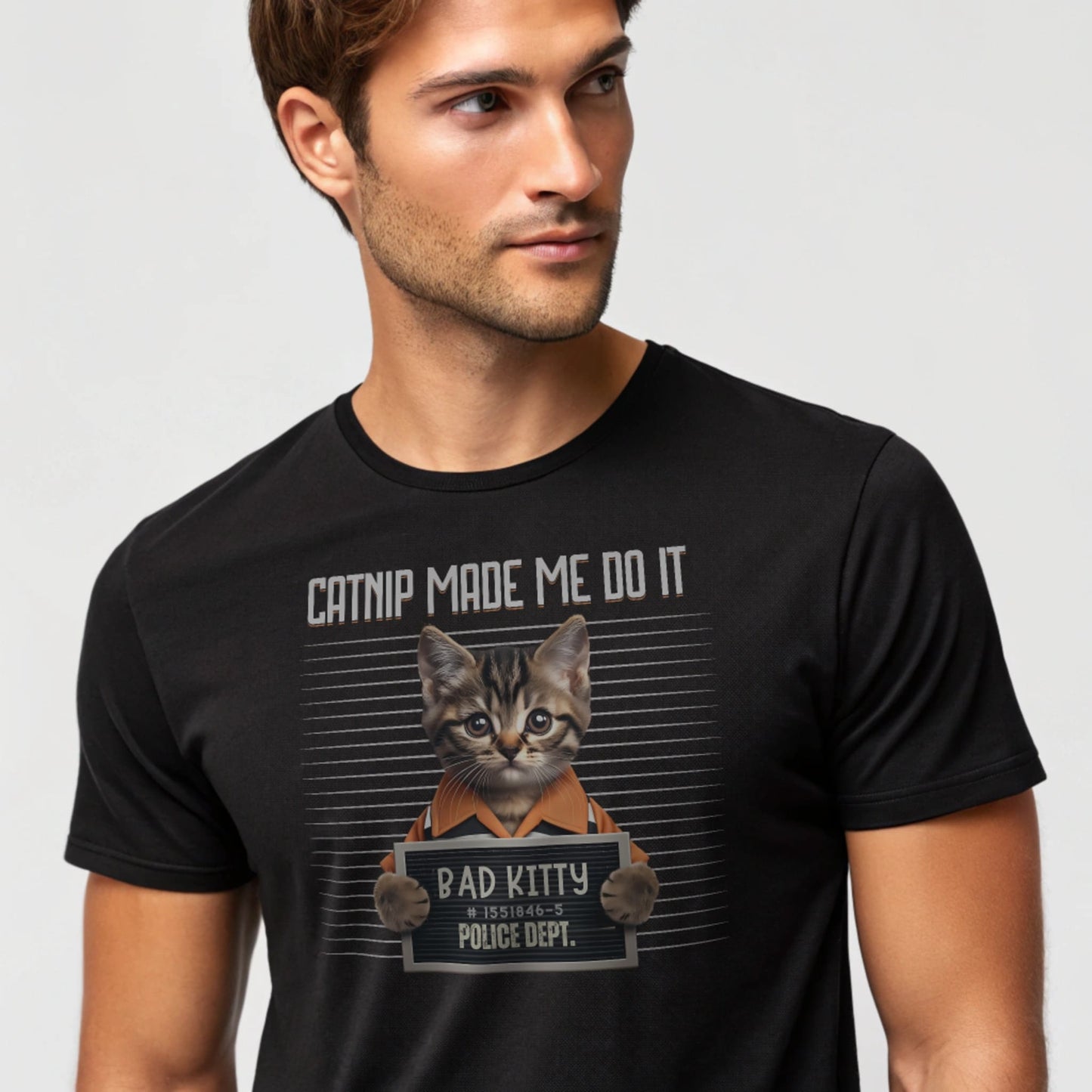 Black studio mockup of Catnip Made Me Do It T-Shirt on a male model, front view, natural eyes, plain crew neck