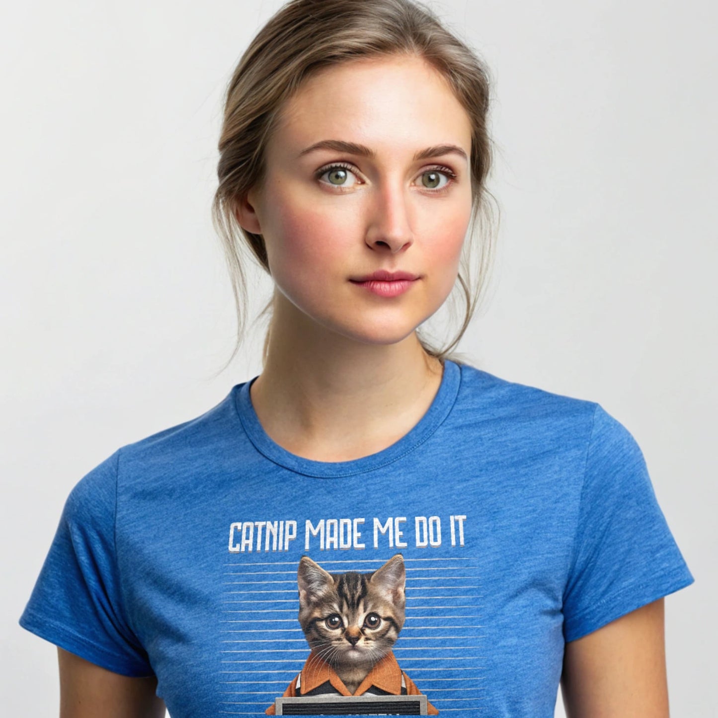 Navy studio mockup of Catnip Made Me Do It T-Shirt on a female model, front view, natural eyes, plain crew neck