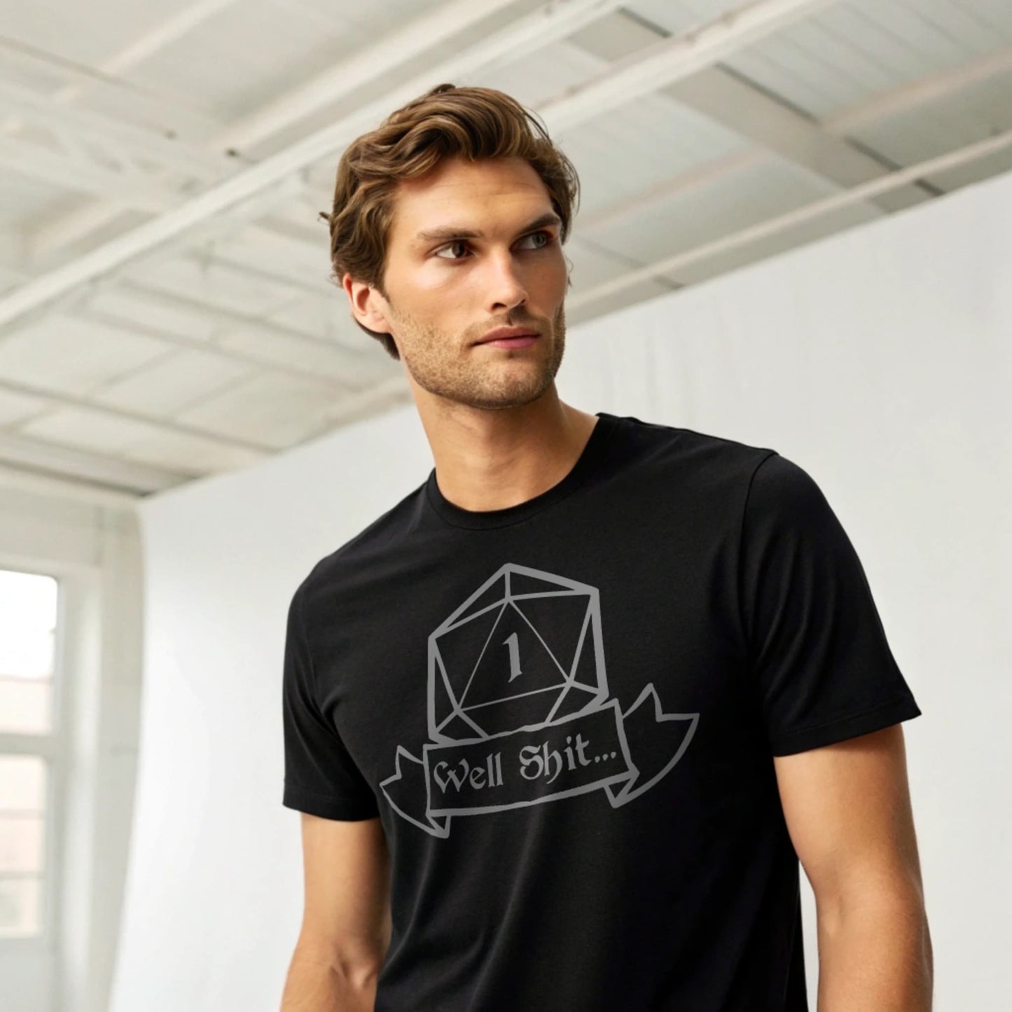 Man wearing black Critical Fail T-shirt, studio mockup