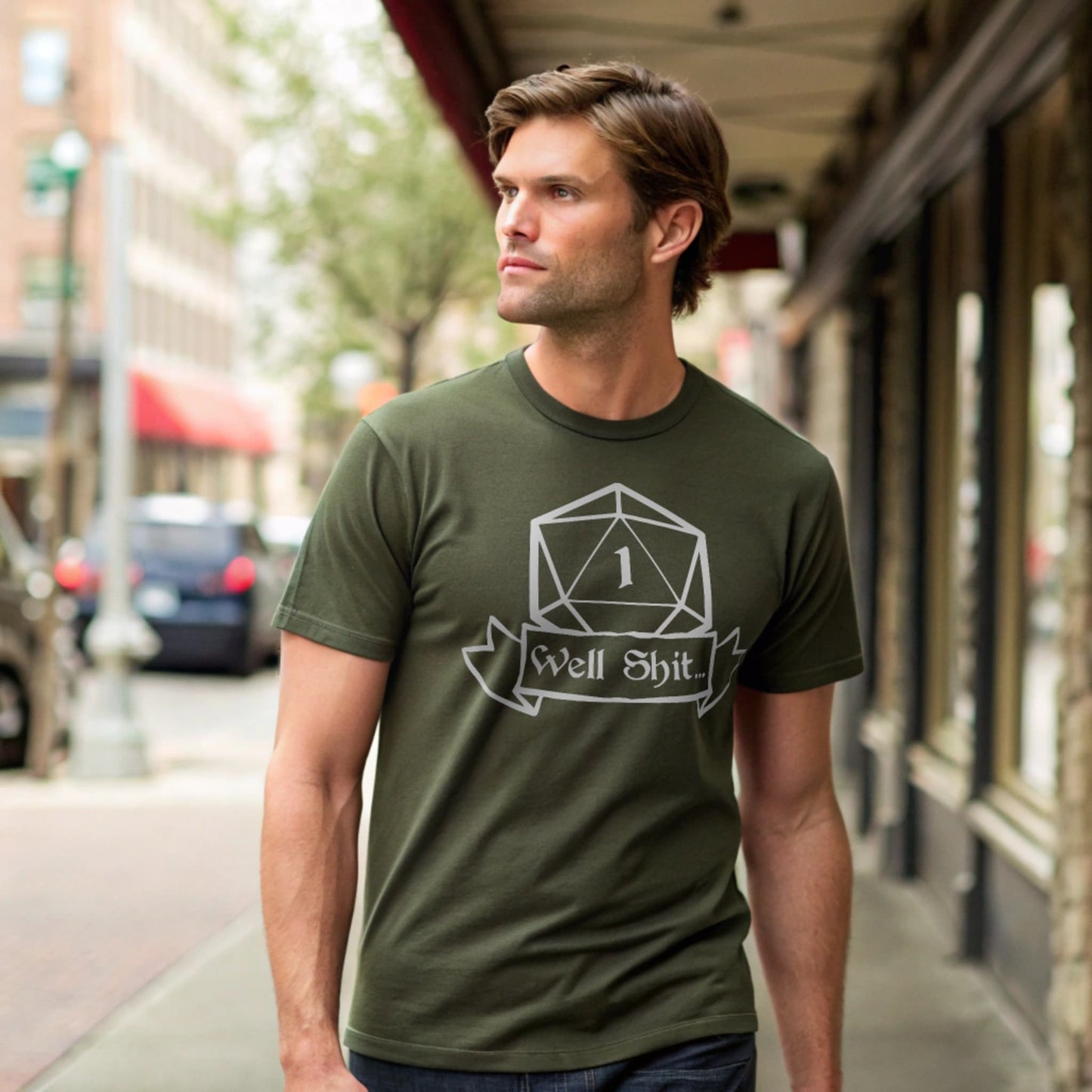 Man outside wearing military green Critical Fail T-shirt, lifestyle mockup