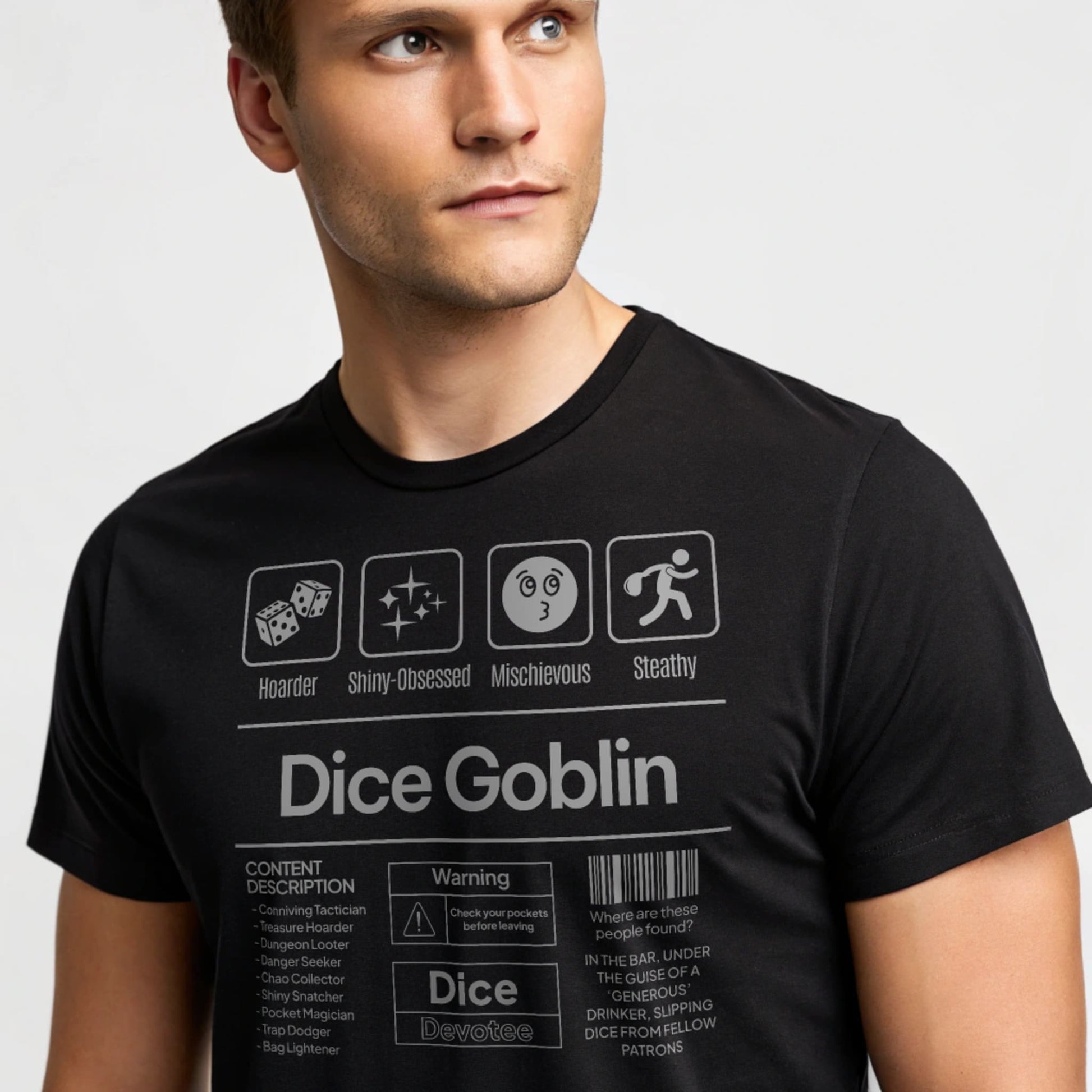 Black studio mockup of Dice Goblin T-Shirt on a male model, front view, natural lifelike eyes, plain crew neck