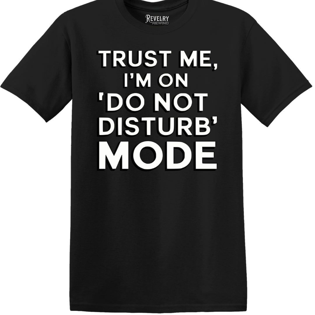 Black “Do Not Disturb Mode” t-shirt flatlay with bold white text
