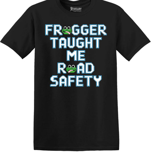Flat lay of Frogger Taught Me Road Safety design on black t-shirt
