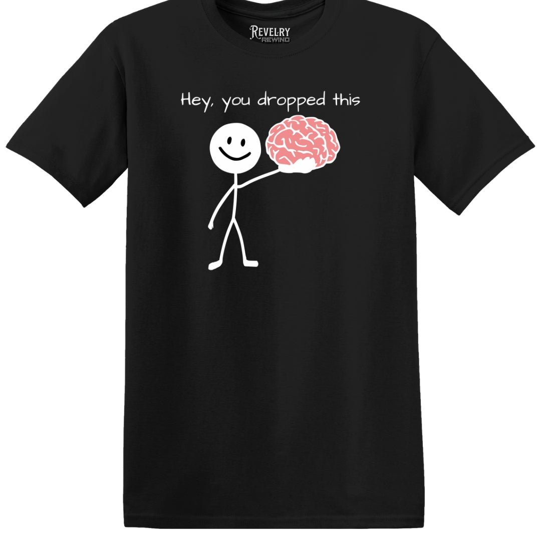 Flat lay of Hey You Dropped This design on black t-shirt