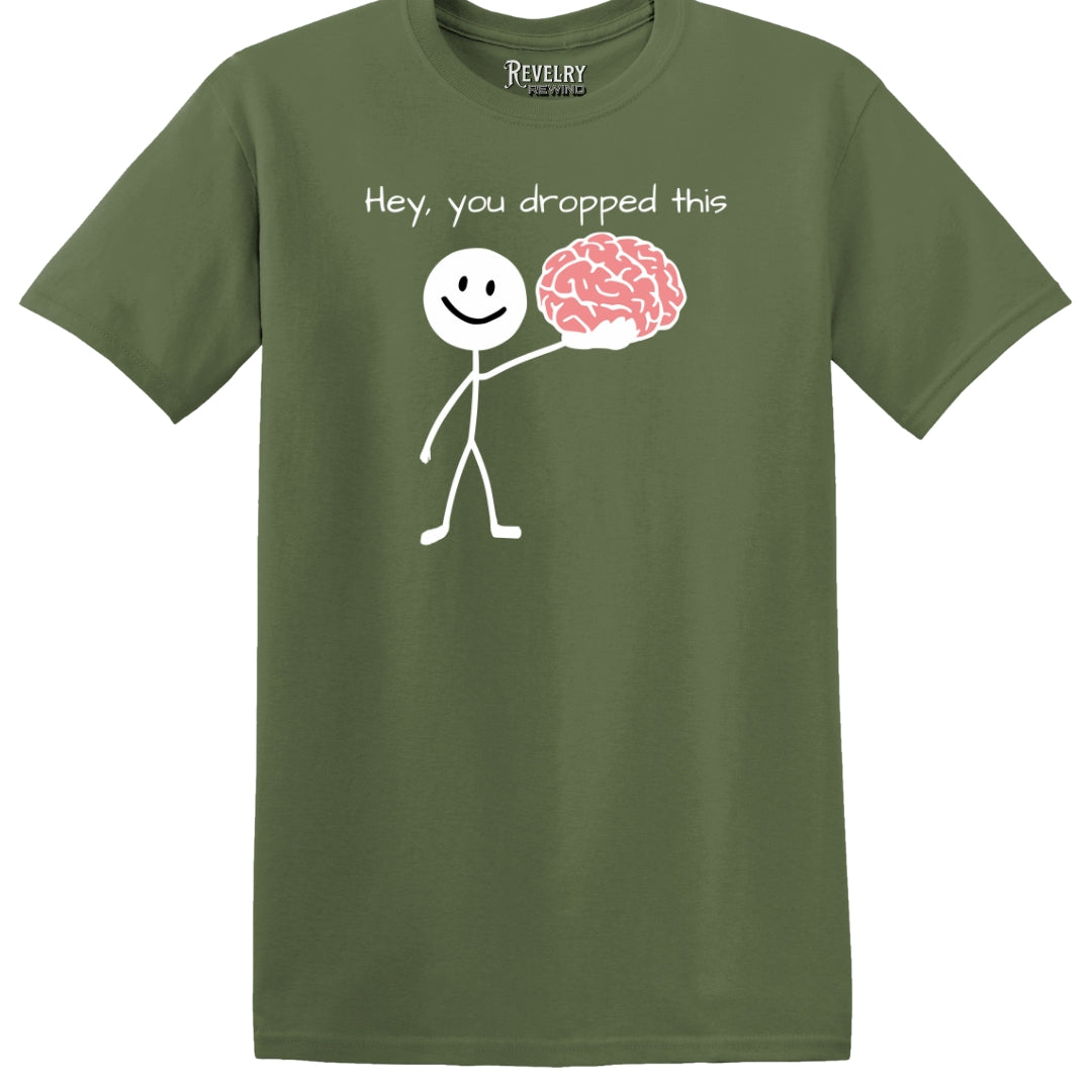 Flat lay of Hey You Dropped This design on military green t-shirt