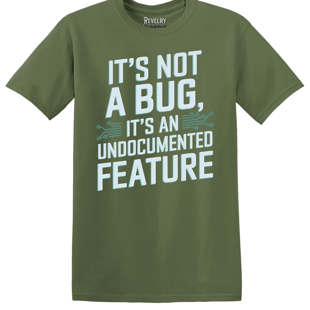 Flat lay of It's Not a Bug, It's a Feature design on military green t-shirt