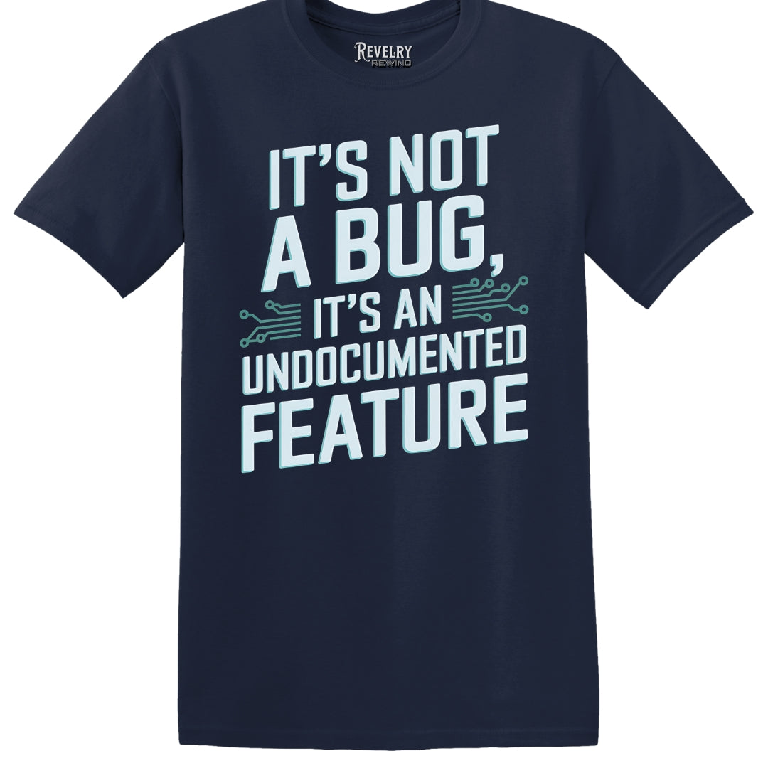 Flat lay of It's Not a Bug, It's a Feature design on navy t-shirt