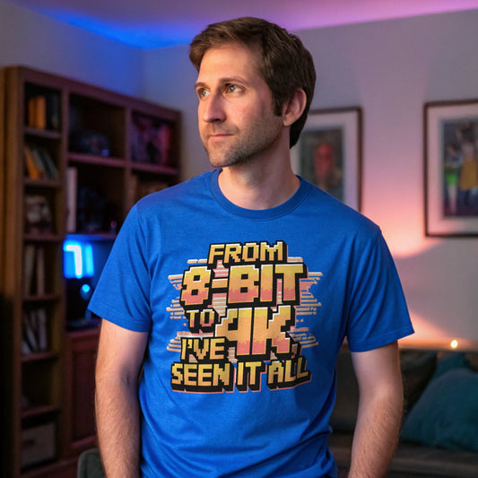Realistic mockup of a man wearing a royal blue "From 8-Bit to 4K, I've Seen It All" retro gaming t-shirt in a nostalgic living room