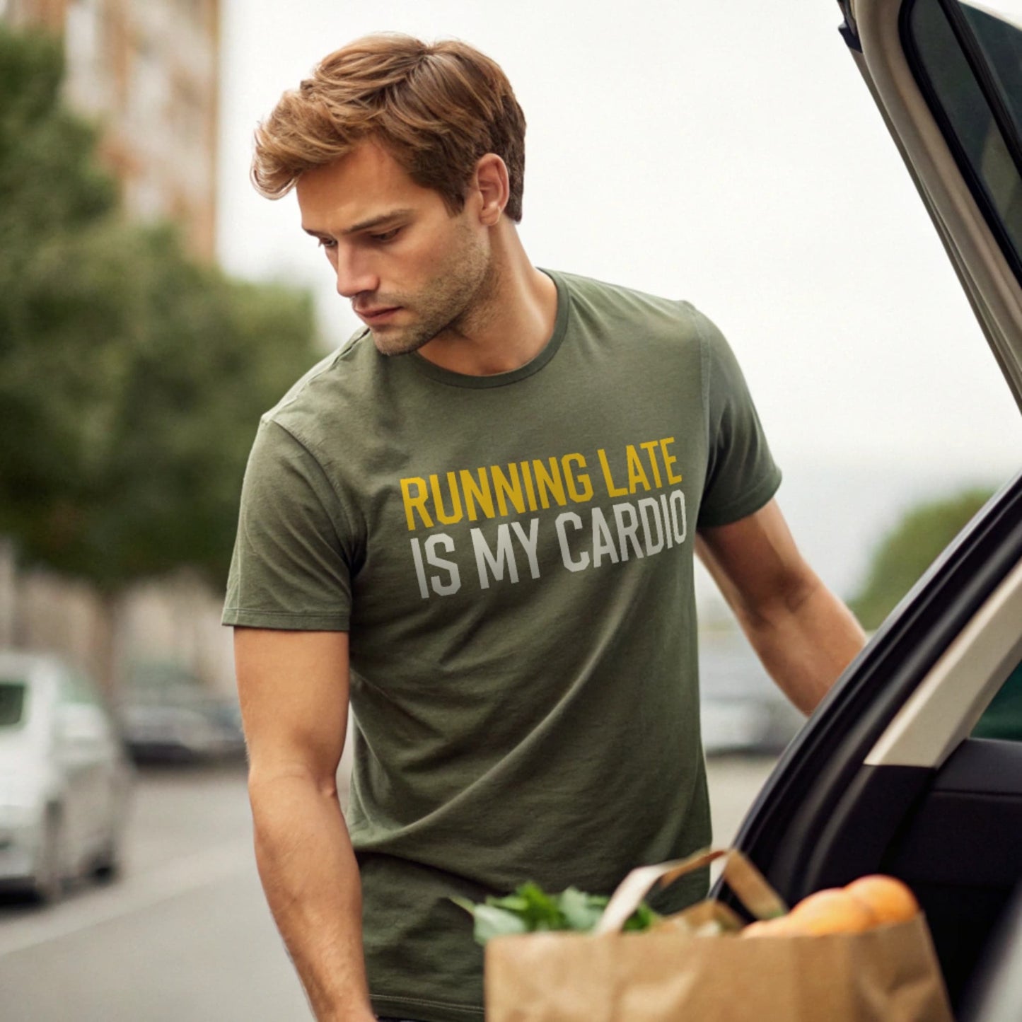 Military Green lifestyle mockup of Running Late Cardio T-Shirt loading groceries into a car, male model