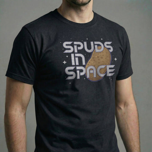 man wearing a black โSpuds in Spaceโ t-shirt with retro sci-fi potato graphic