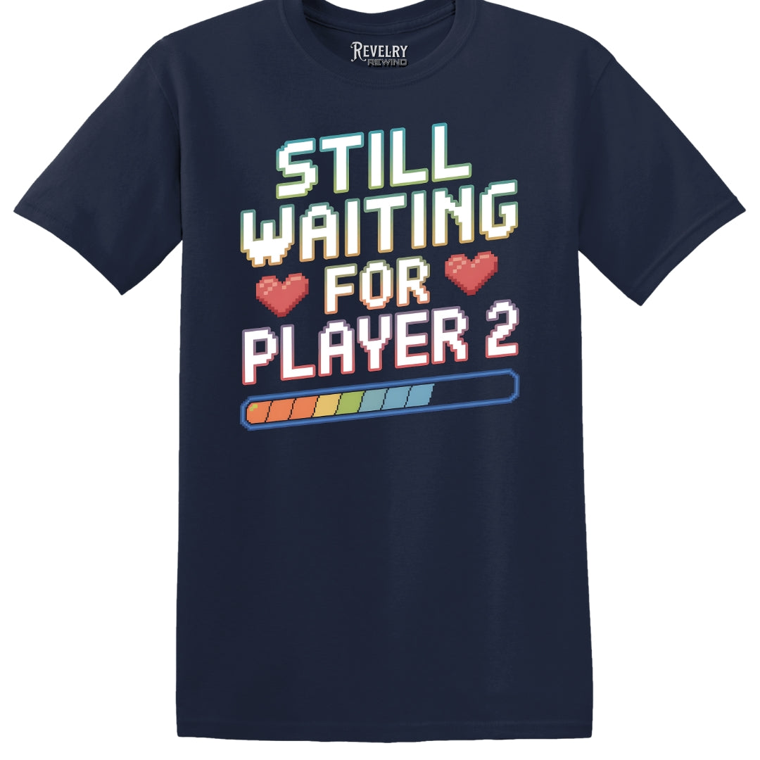 Flat lay of Still Waiting for Player 2 design on navy blue t-shirt