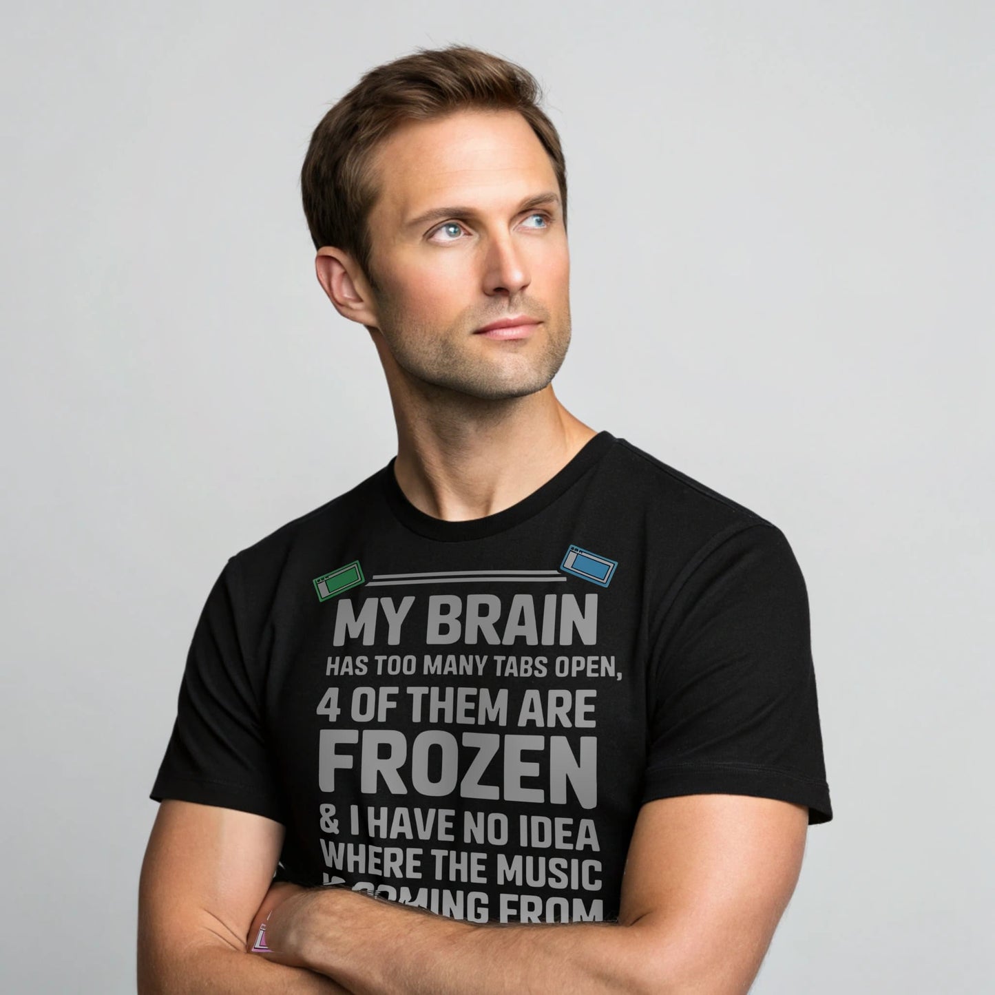 Hyper-realistic mockup of a 25–40-year-old man wearing a black Too Many Tabs T-Shirt facing the camera against a light gray studio backdrop.