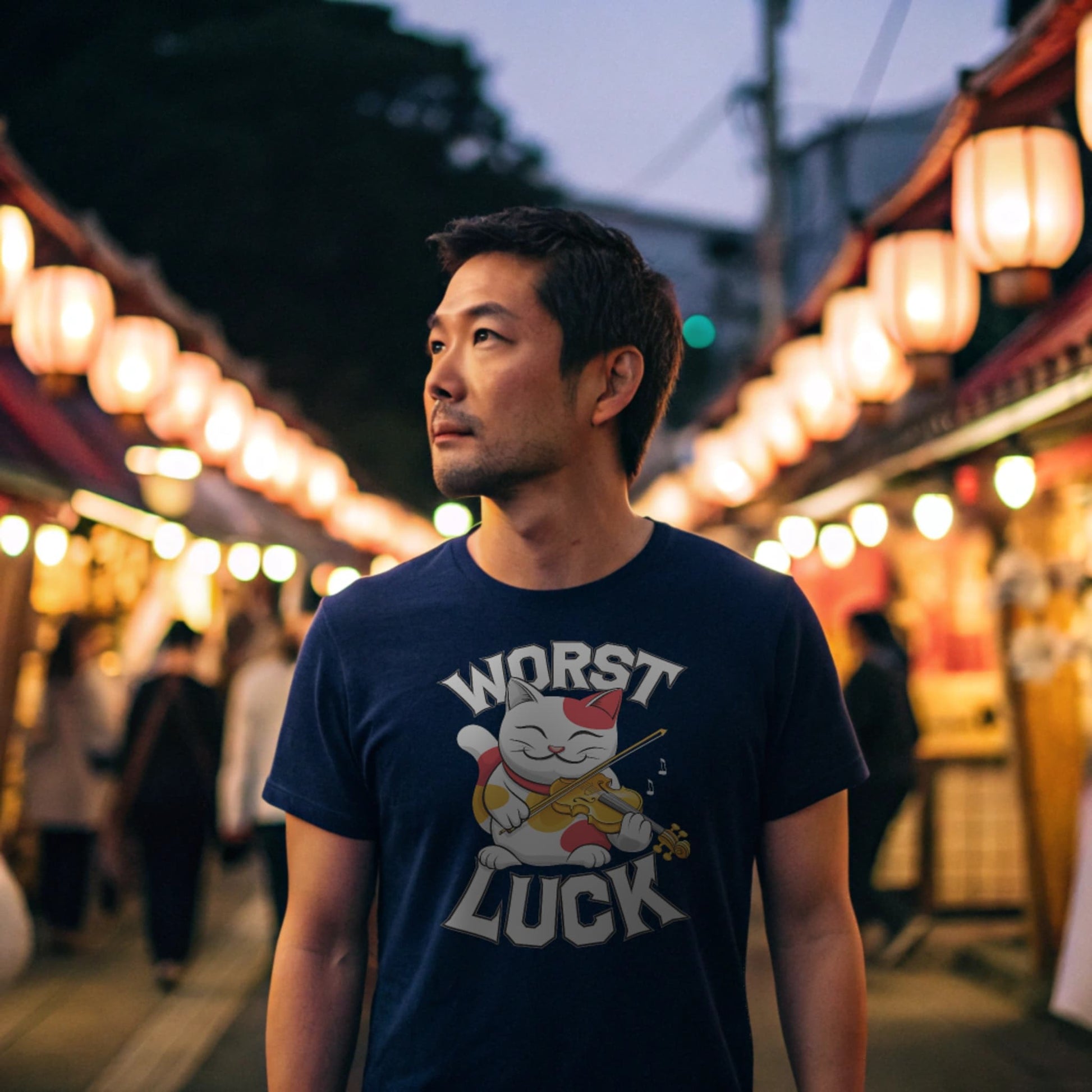 Navy lifestyle mockup of Worst Luck T-Shirt on a male model strolling through a lantern-lit street festival, plain crew neck