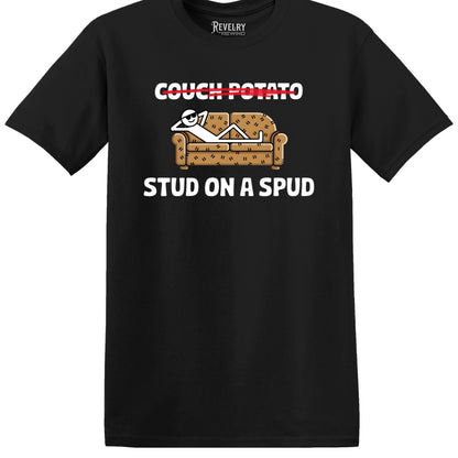 Flat lay of Couch Potato Stud on a Spud design on black t-shirt