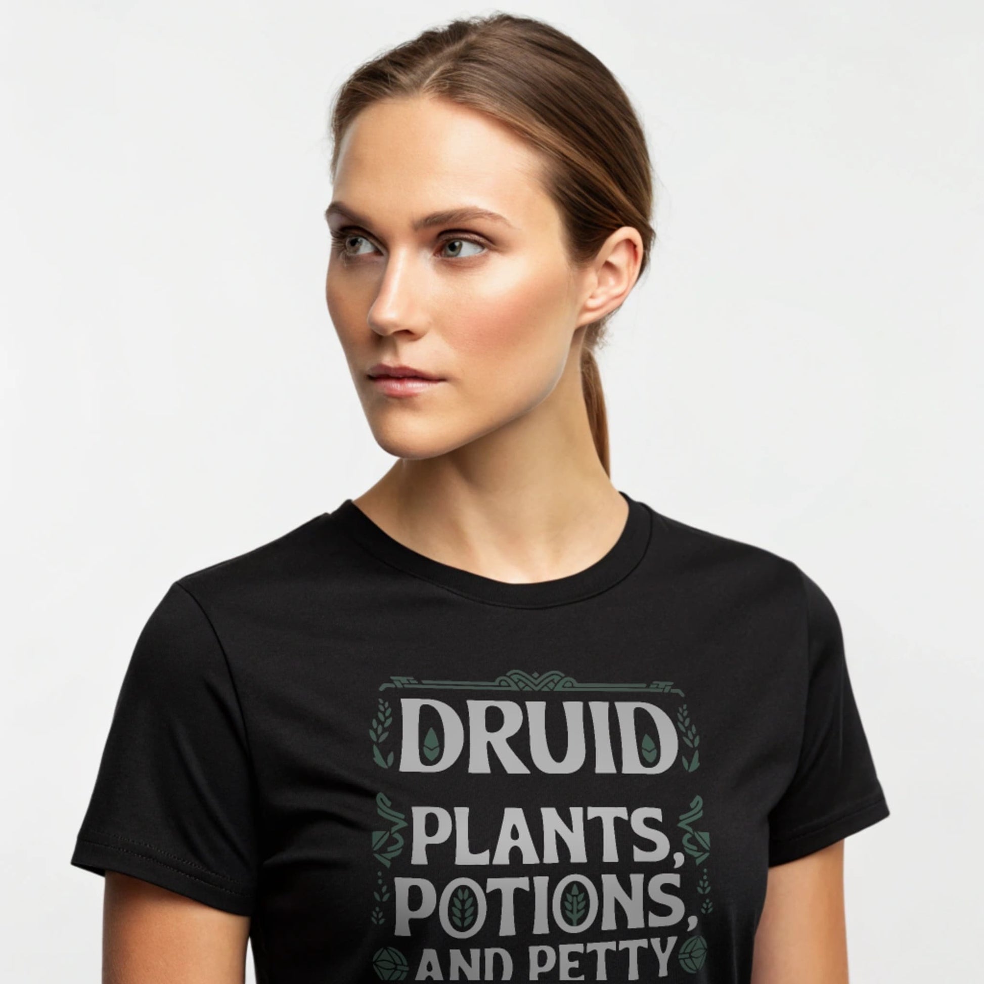 Black studio mockup of Druid Petty Revenge T-Shirt on a female model, front view, natural eyes, plain crew neck