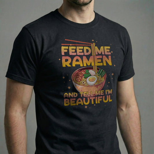 Man wearing a black “Feed Me Ramen and Tell Me I’m Beautiful” t-shirt showing the full front design