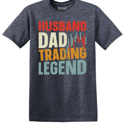 Flat lay of Husband Dad Trading Legend design on heather navy t-shirt