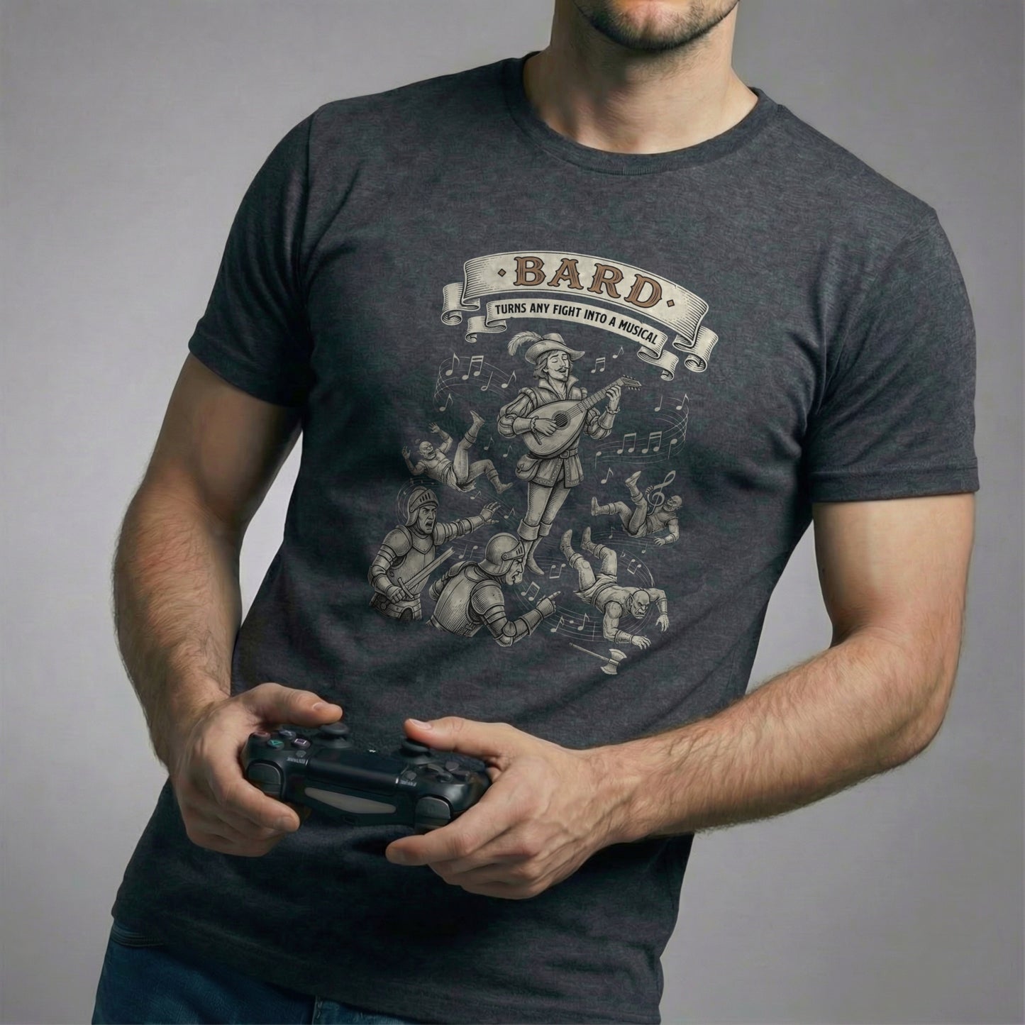 Man holding a video game controller wearing a dark heather grey Revelry Rewind t-shirt. The shirt features a funny vintage RPG design of a Bard playing a lute while battle chaos erupts around him.