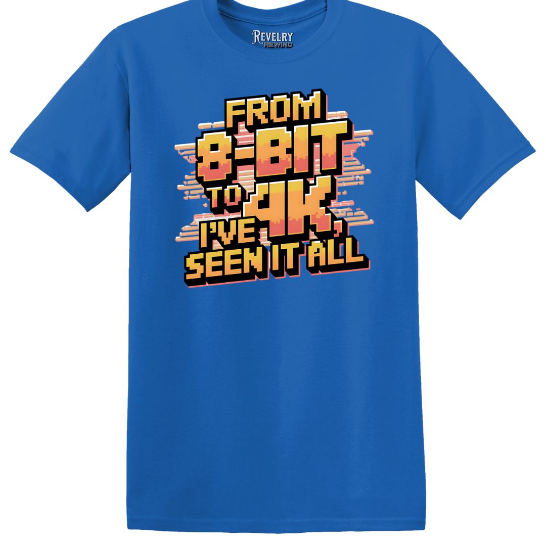 Royal blue t-shirt flatlay with bold “From 8-Bit to 4K I’ve Seen It All” graphic