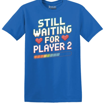 Flat lay of Still Waiting for Player 2 design on royal blue t-shirt