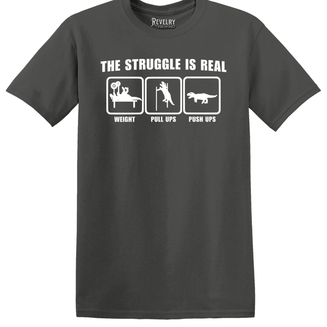 Flat lay of The Struggle Is Real design on charcoal t-shirt