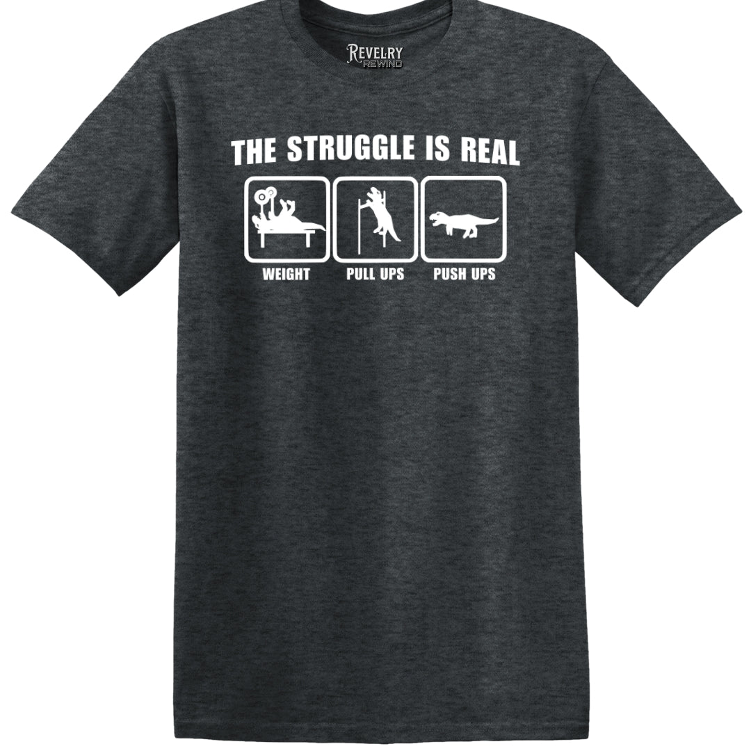 Flat lay of The Struggle Is Real design on dark heather t-shirt