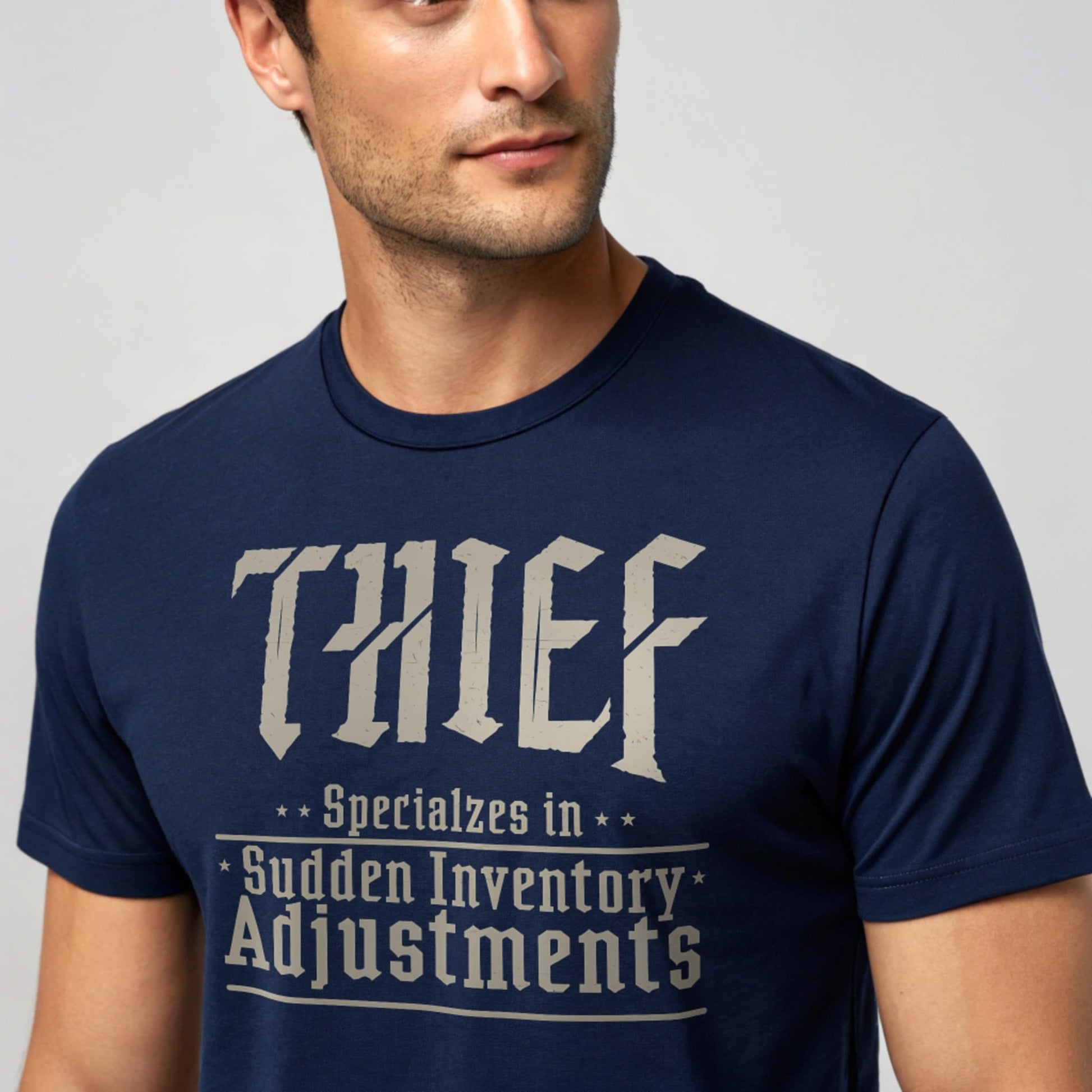 Navy studio mockup of Thief: Sudden Inventory Adjustments T-Shirt on a male model, front view, plain crew neck