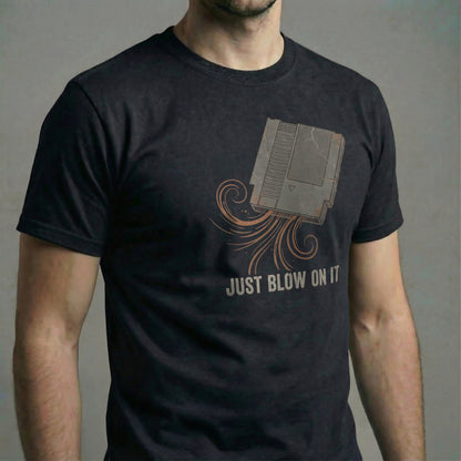 Just Blow On It vintage gaming cartridge t-shirt in System Black.