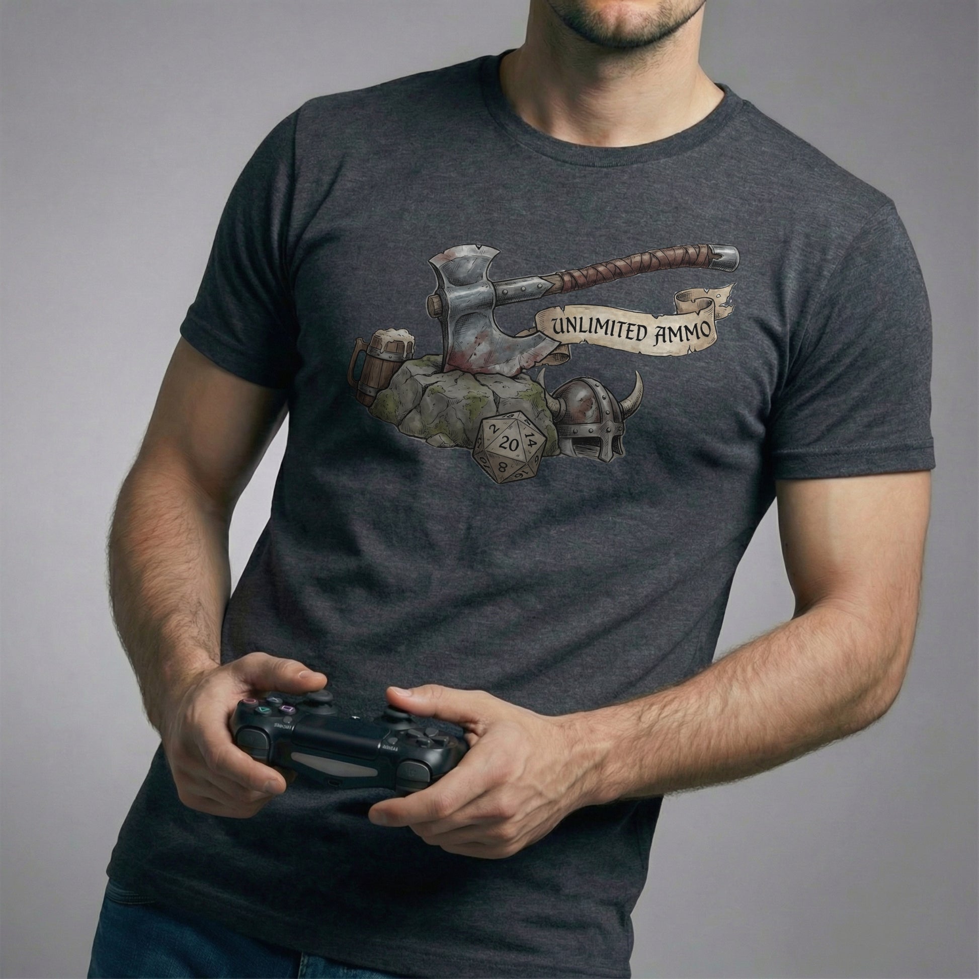 Dark heather gaming t-shirt worn by model holding a controller, showing a centered fantasy axe and “Unlimited Ammo” graphic.