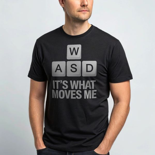 Hyper-realistic mockup of a 25–40-year-old man wearing a plain Gildan 64000 black crew-neck t-shirt with the WASD Moves design, facing the camera against a light-gray backdrop.