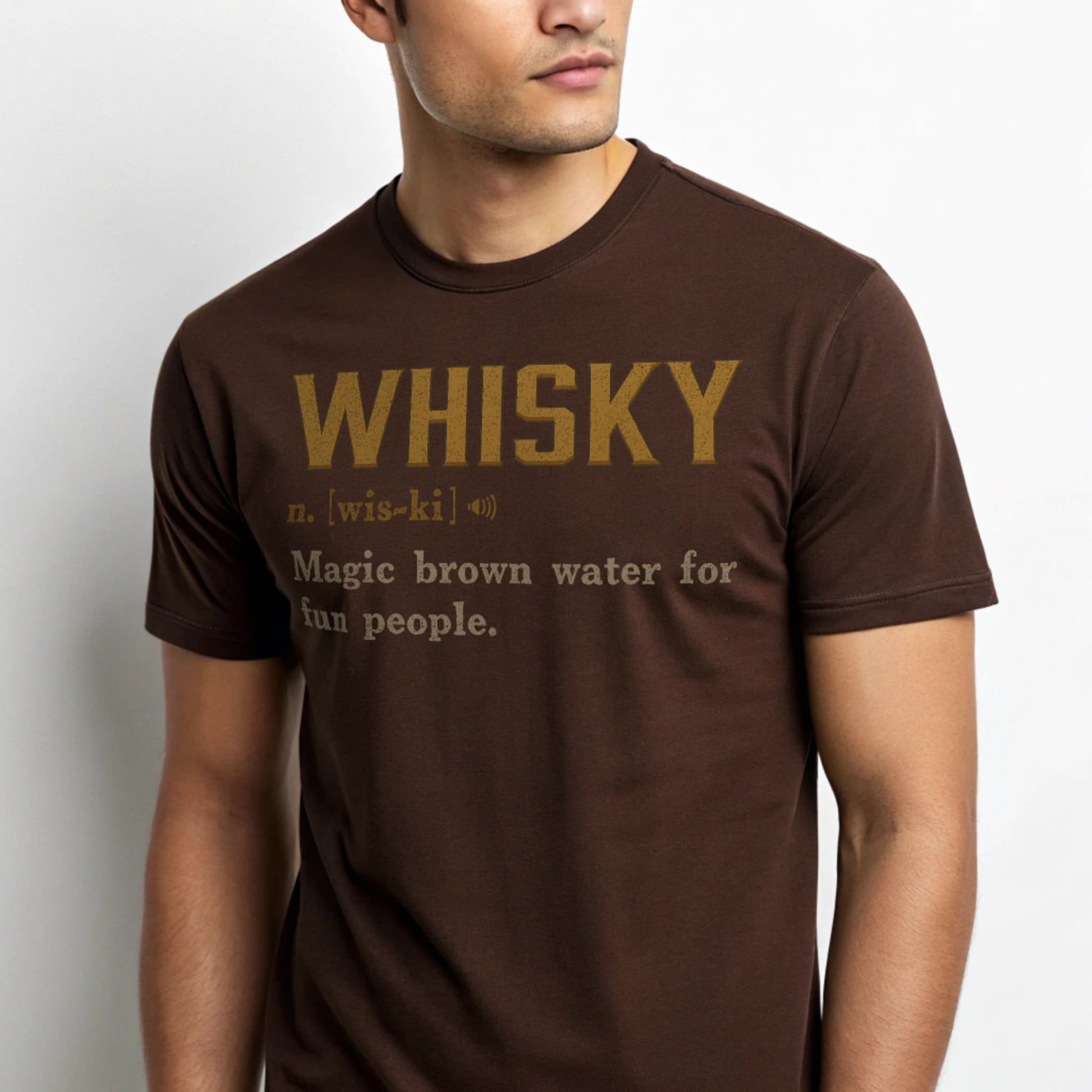 Studio mockup of Whisky Definition T-Shirt in Dark Chocolate showing ‘Whisky n. [wis-ki] Magic brown water for fun people’ design.
