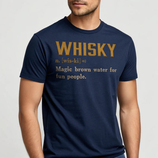 Studio mockup of Whisky Definition T-Shirt in Navy showing ‘Whisky n. [wis-ki] Magic brown water for fun people’ design.